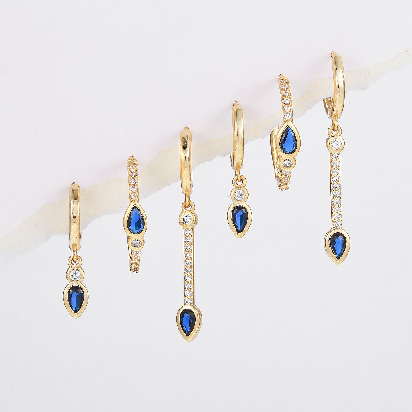 Stylish Blue Zircon Heart-shaped Earrings Exude A Touch Of Understated Luxury